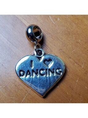 NWOT charm, silver colored heart, 'I Love Dancing'
